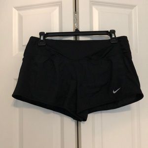 Black Nike running shorts